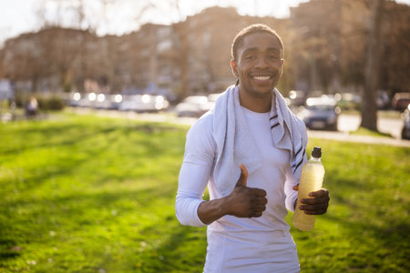 Portrait of young african-american man who is ready for jogging.の写真素材
