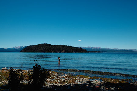 evening comes over the mountain lake Nahuel Huapi