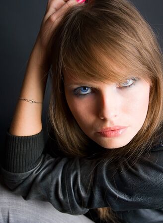 portrait of beautiful women on black backgroundの写真素材