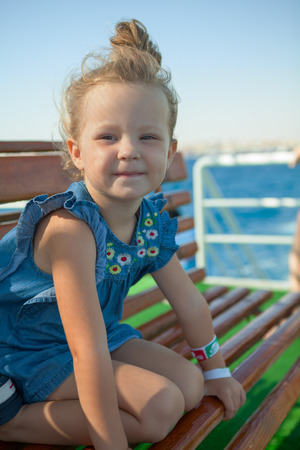 pretty little girl looking at youの写真素材