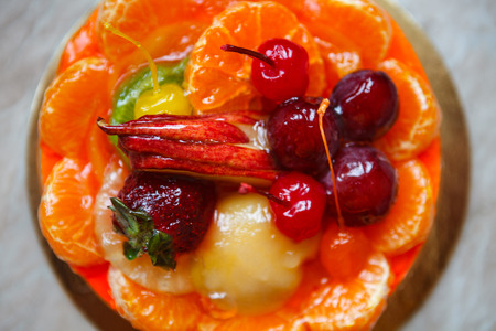 Colorful homemade fruit orange cake