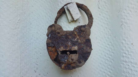 Vintage padlock on a white backgroundの写真素材