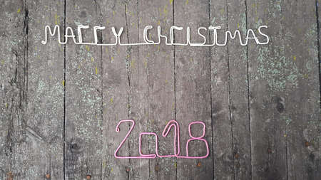 Merry Christmas in 2018. The inscription on wooden boardsの写真素材