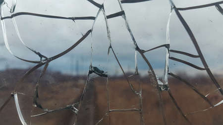 The cracked glass. Broken glass. Abstract background,