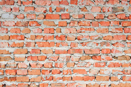 Old wall from a red brickの写真素材