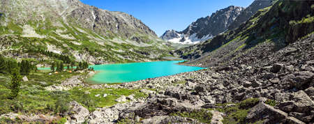 Mountain landscape, beautiful turquoise lake and mountain range, large panorama, Altai, Russia.の写真素材