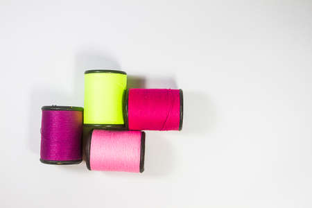 The white background of multi color treads roll