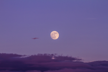 Full moon and the clouds in the background.の写真素材