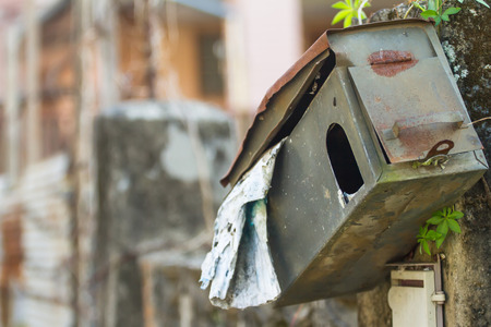 Portrait of old mail box which is the background.の写真素材