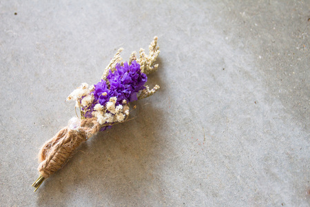A bouquet of flowers made from flowering grasses that are impregnated with color. There are several different sizes.の写真素材