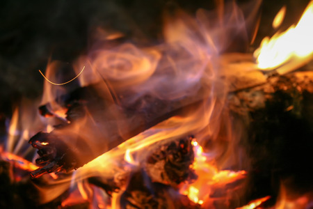 Abstract image of wood burned. Using a beam of light and cooking inside the camp.