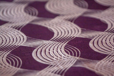 Applique motifs were used to decorate the table, which is used as a background. in selective focus.