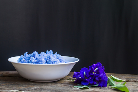 Steamed rice is mixed with a Clitoria ternatea is a good herb for the body.の写真素材