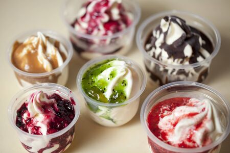 ice cream in a plastic containerの写真素材