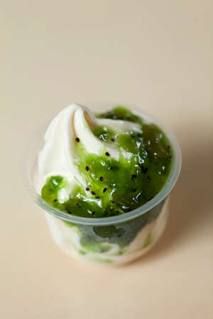 ice cream in a plastic containerの写真素材