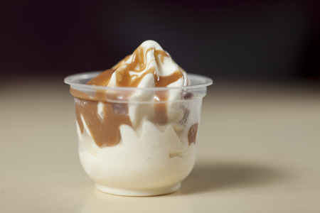 ice cream in a plastic containerの写真素材