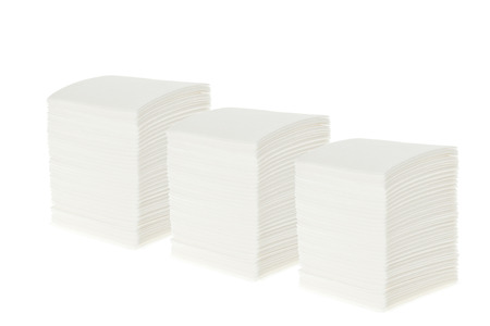 bunch of white napkins isolated on whiteの写真素材