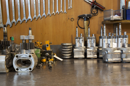 hydraulic engine parts  on the work tableの写真素材