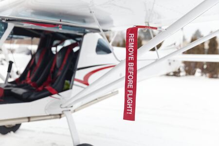 remove before flight, on small airplane close up