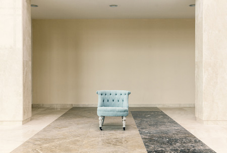 blue chairs in space and wallの写真素材