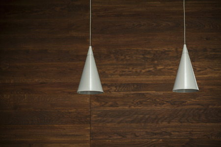 abstract background with two lamps, wooden wall backgroundの写真素材