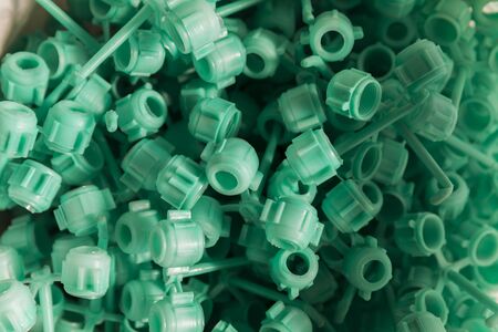 many plastic closures, close upの写真素材