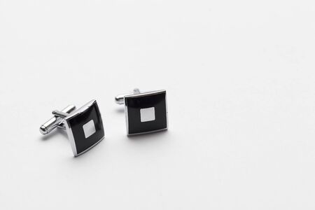 silver cufflinks on white background, close upの写真素材