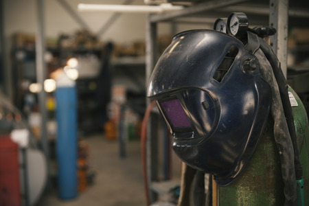 welding mask in workshop, close upの写真素材