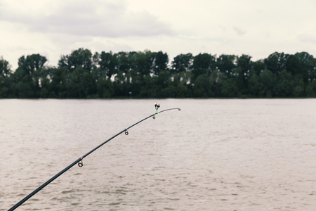 fishing rod and river, close up