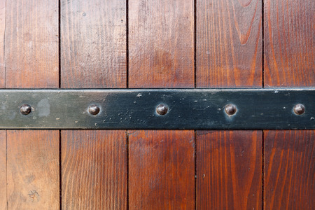 old wooden door with iron