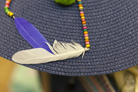 decorative feathers on hat, close upの写真素材