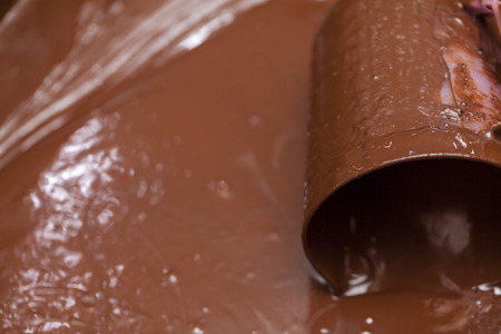 melted chocolate close up, abstract backgroundの写真素材