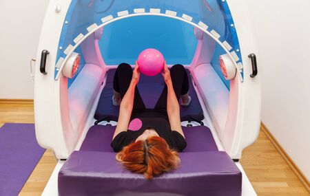 young girl exercise at the gym