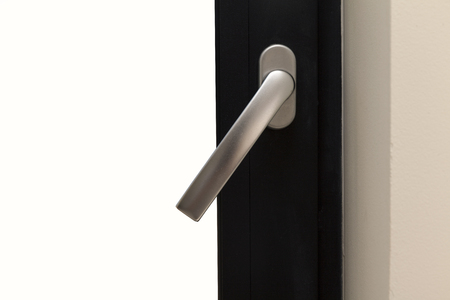 handle on pvc window, close upの写真素材