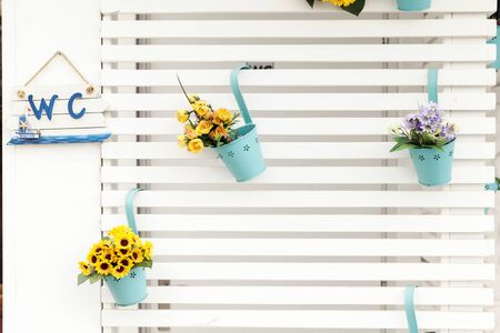 wooden wall with shelves for flowers, background textureの写真素材
