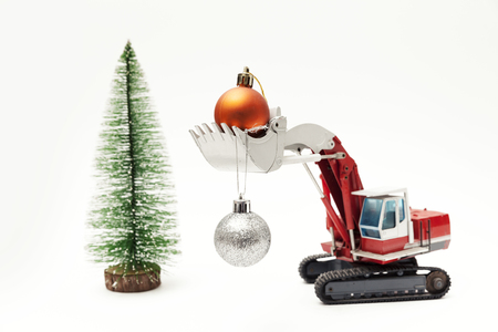 Excavator toy Move silver Christmas ball, copy spaceの写真素材