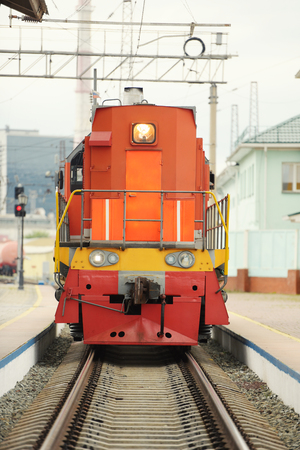 red locomotive on the tracks in a railway station
のeditorial素材