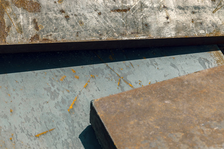 rusty scrap metal in a pile, abstract backgroundの写真素材