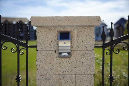 solar lamp on fence with sensorの写真素材