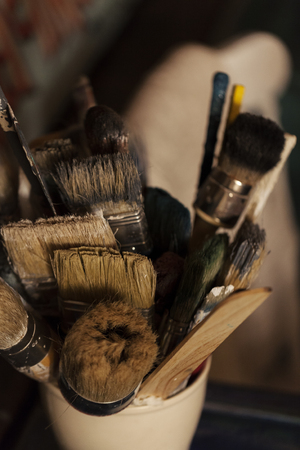 paint brush in the pot, close upの写真素材