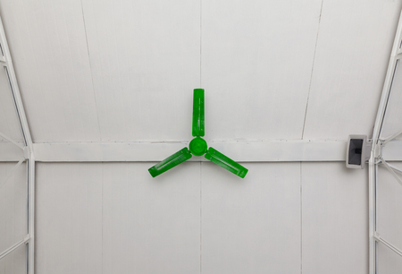 large industrial fan under the roofの写真素材