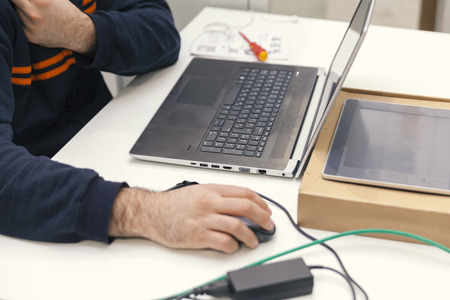 engineer working on the laptop in the factoryの写真素材