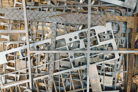 scrap metal on piles, abstract industry backgroundの写真素材