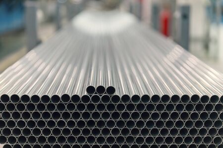 steel pipes on the pile, close upの写真素材