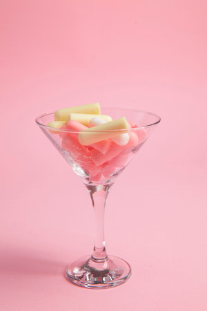 cosmetic background with cosmetic sticks and flovers in the glass, close upの写真素材