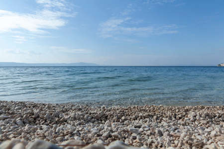 empty sunny beach, close up on sandの写真素材