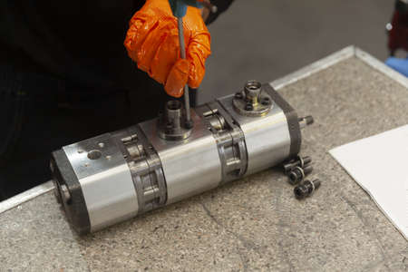 servicing a gear hydraulic pump on tableの写真素材