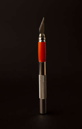 scalpel for art on black background, close upの写真素材