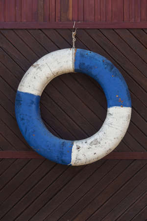 lifebelt on a wooden wall, vintage close upの写真素材