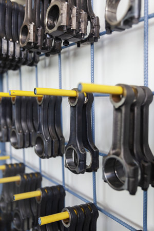 connecting rod on the wall, different models, close upの写真素材